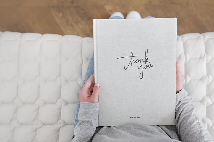 Photo book held in hands