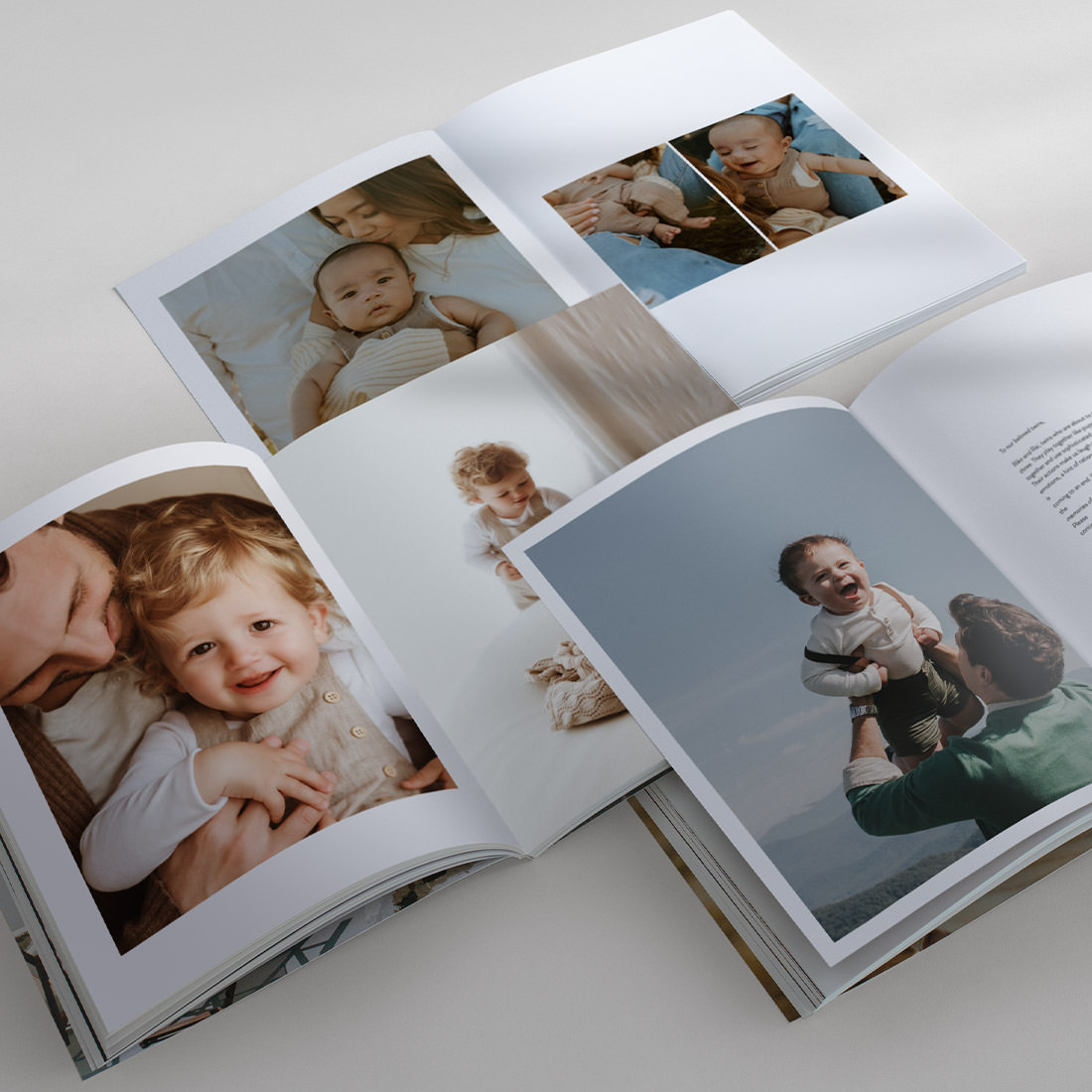 Three Baby Magazines open to show spreads with Designer Templates