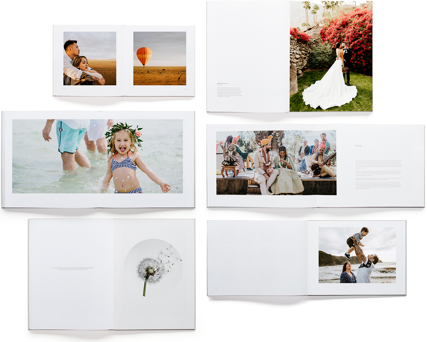 Álbuns de fotos abertos em diferentes formatos e com fotos diferentes.