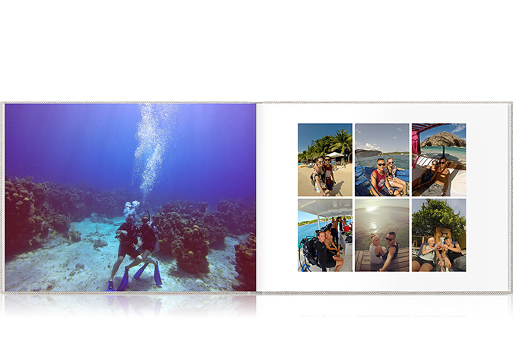 Open photo book showing spread of travel photos