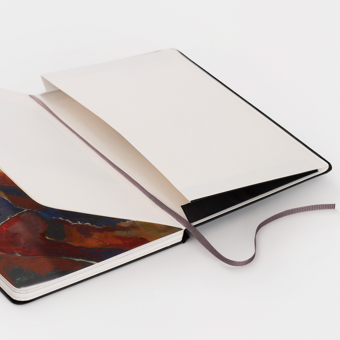 Open Moleskine Photo Book showing ribbon marker and back pocket