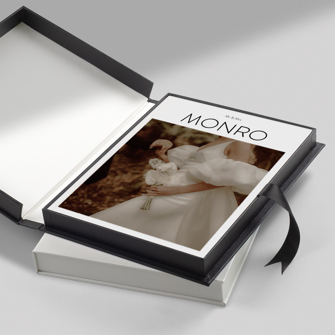 Open Black Buckram Presentation Box with Wedding Magazine inside.